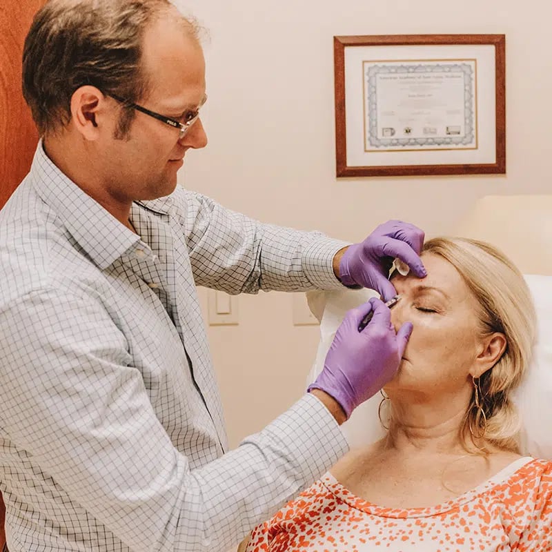 Female patient receiving Botox & Juvederm