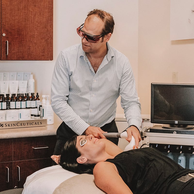 Female patient receiving laser hair removal