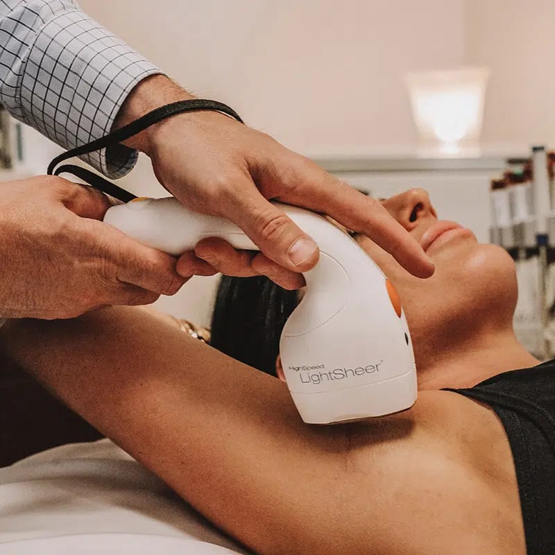 Female patient receiving laser hair removal