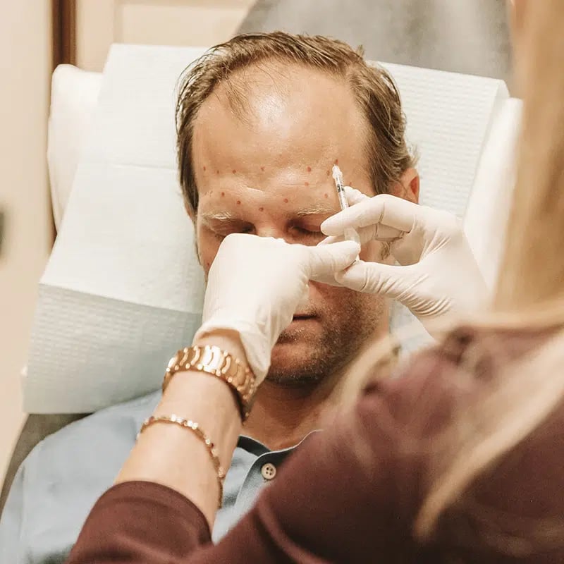 Male patient receiving Botox/Dysport