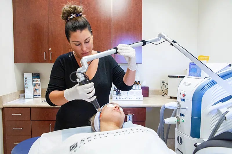 Patient receiving PicoSure photorejuvenation treatment
