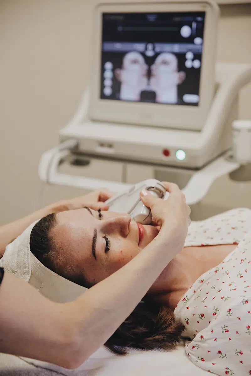 Young woman receiving Ultherapy treatment