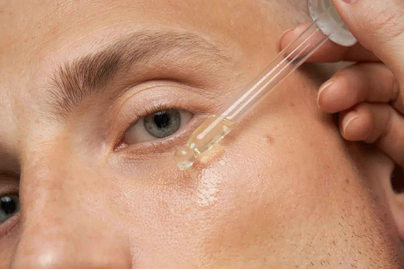 male using skincare