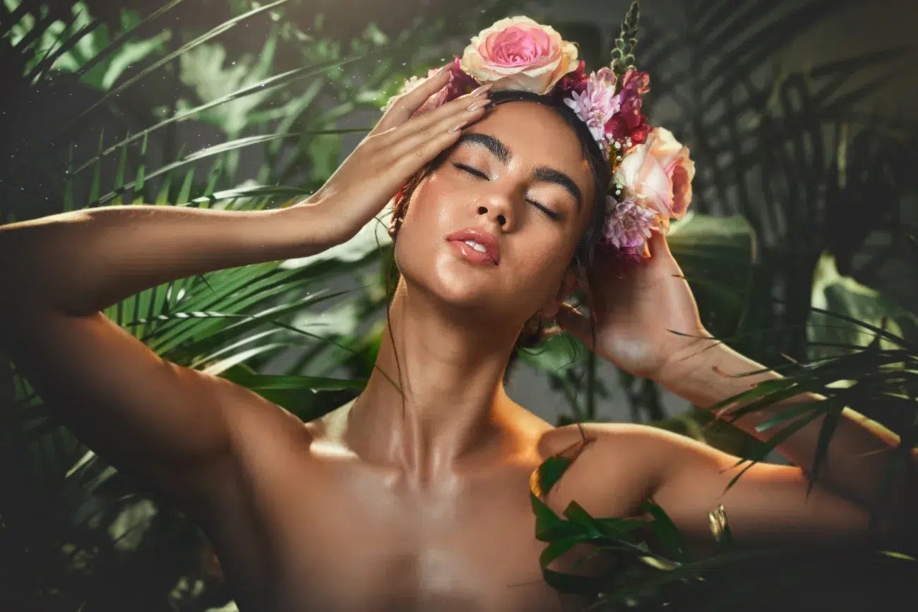 woman wearing floral crown while in water
